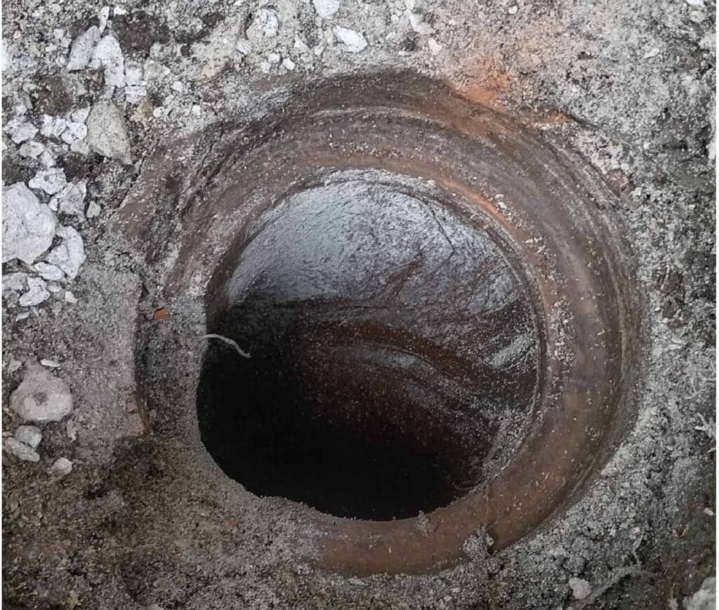 cleaning underground gutter drain sewer